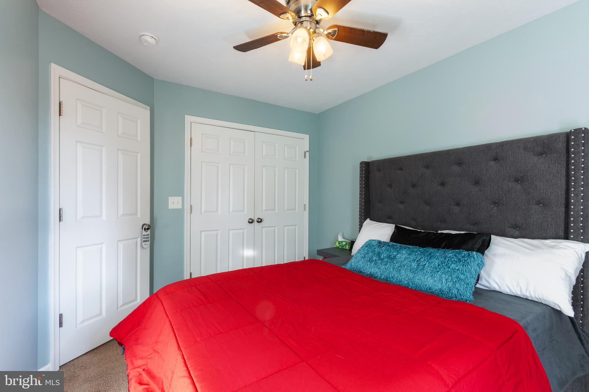 191 Moul Avenue Hanover, PA 17331 - Photo 32 of 49 a bedroom with a bed and a chandelier