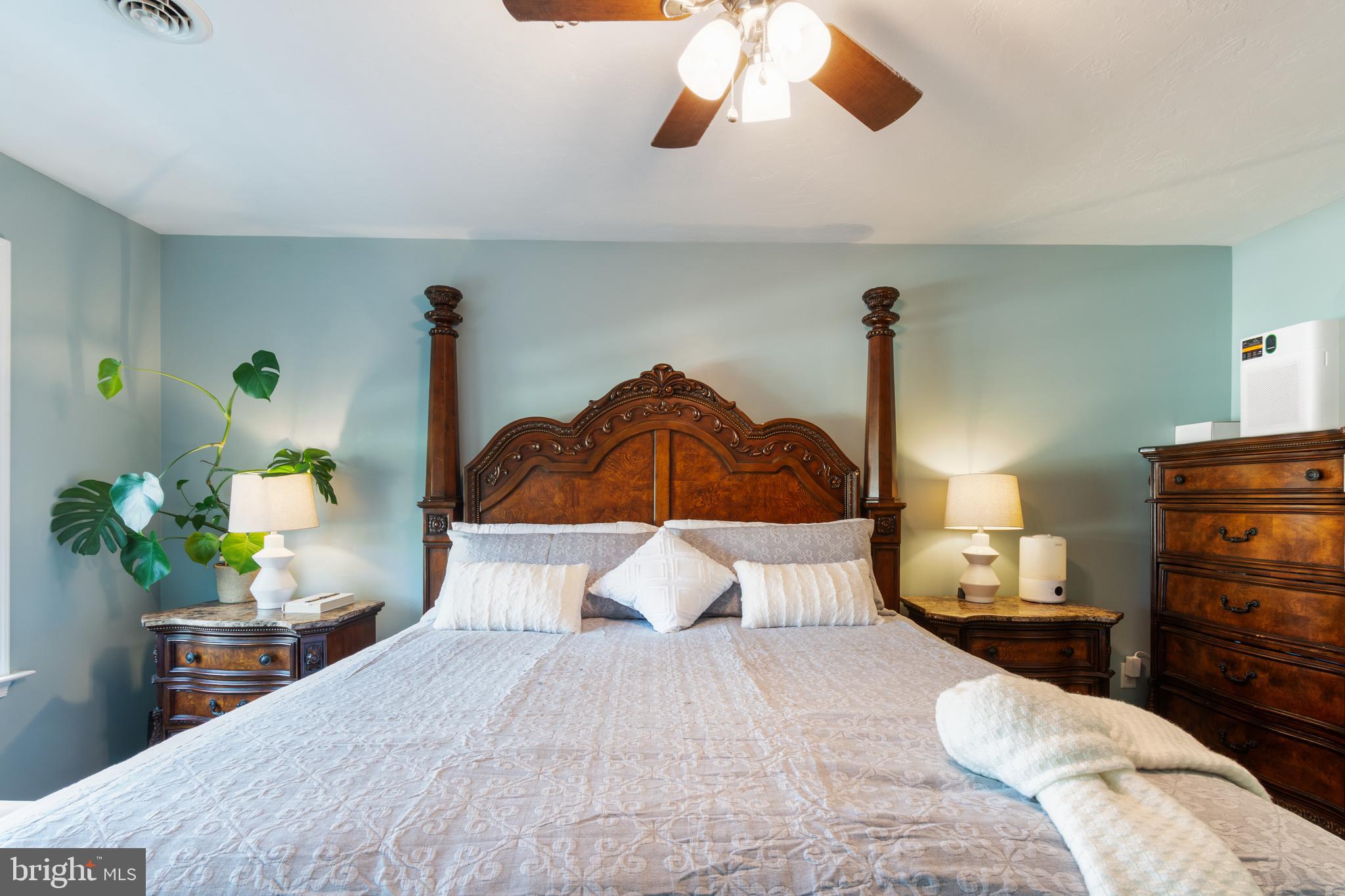 191 Moul Avenue Hanover, PA 17331 - Photo 36 of 49 a bedroom with a bed and a chandelier