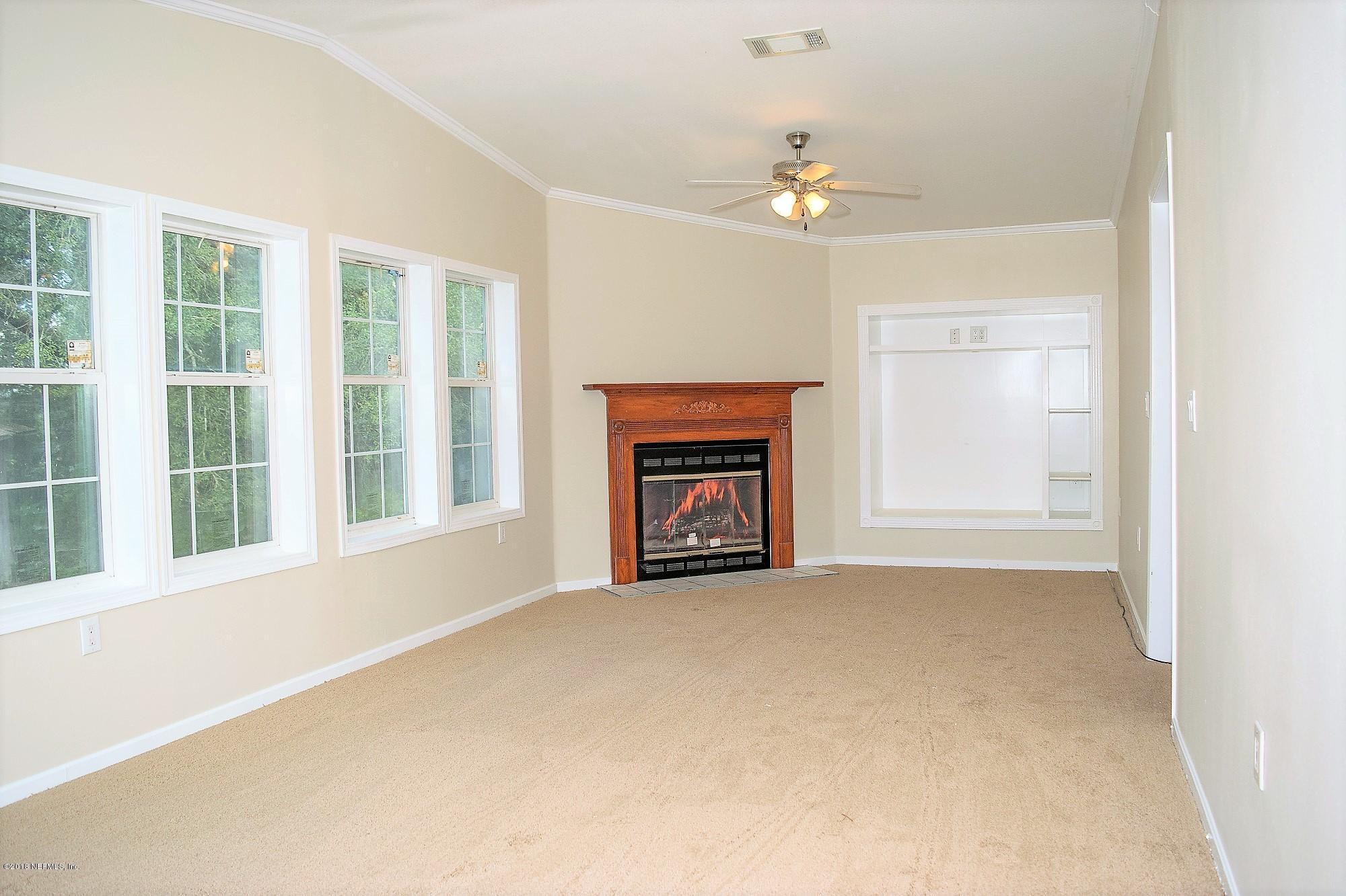 1933 Rose Ridge Court Middleburg, FL 32068 - Photo 20 of 27 Family Room Fireplace