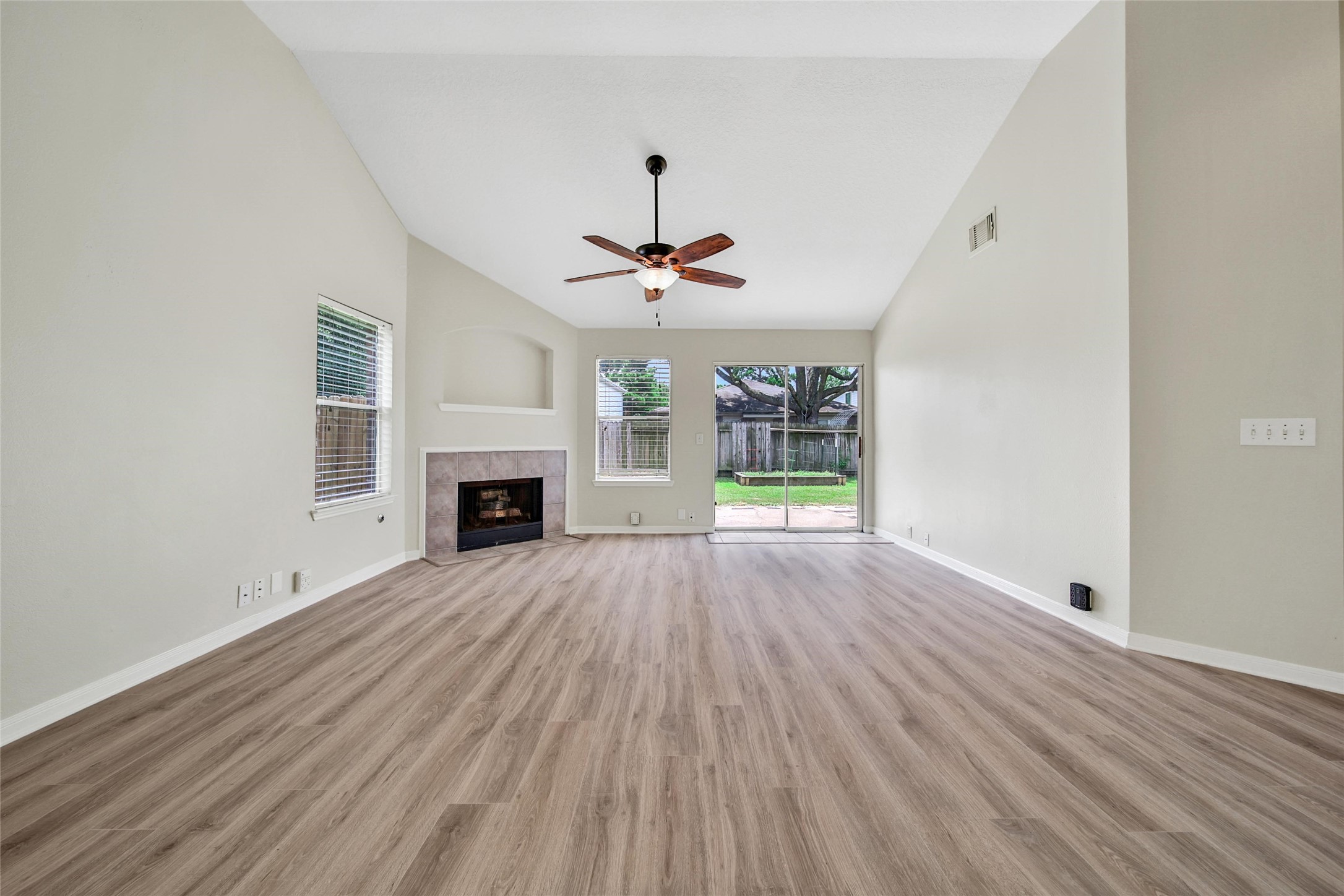 11911 Ezekiel Road Tomball, TX 77375 - Photo 12 of 23 Spacious family room with high ceilings and plenty of space for gatherings.