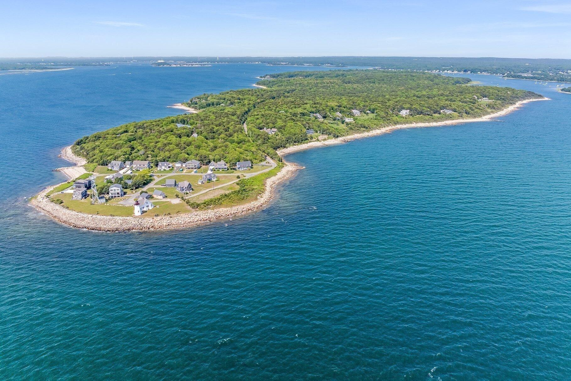 461 Wings Neck Road Pocasset, MA 02559 - Photo 3 of 42 a view of a lake and a yard