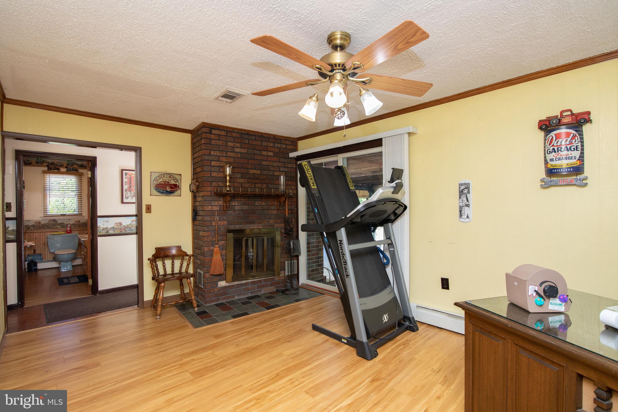 741 Heritage Road Sewell, NJ 08080 - Photo 23 of 60 a view of a livingroom with furniture and a flat screen tv