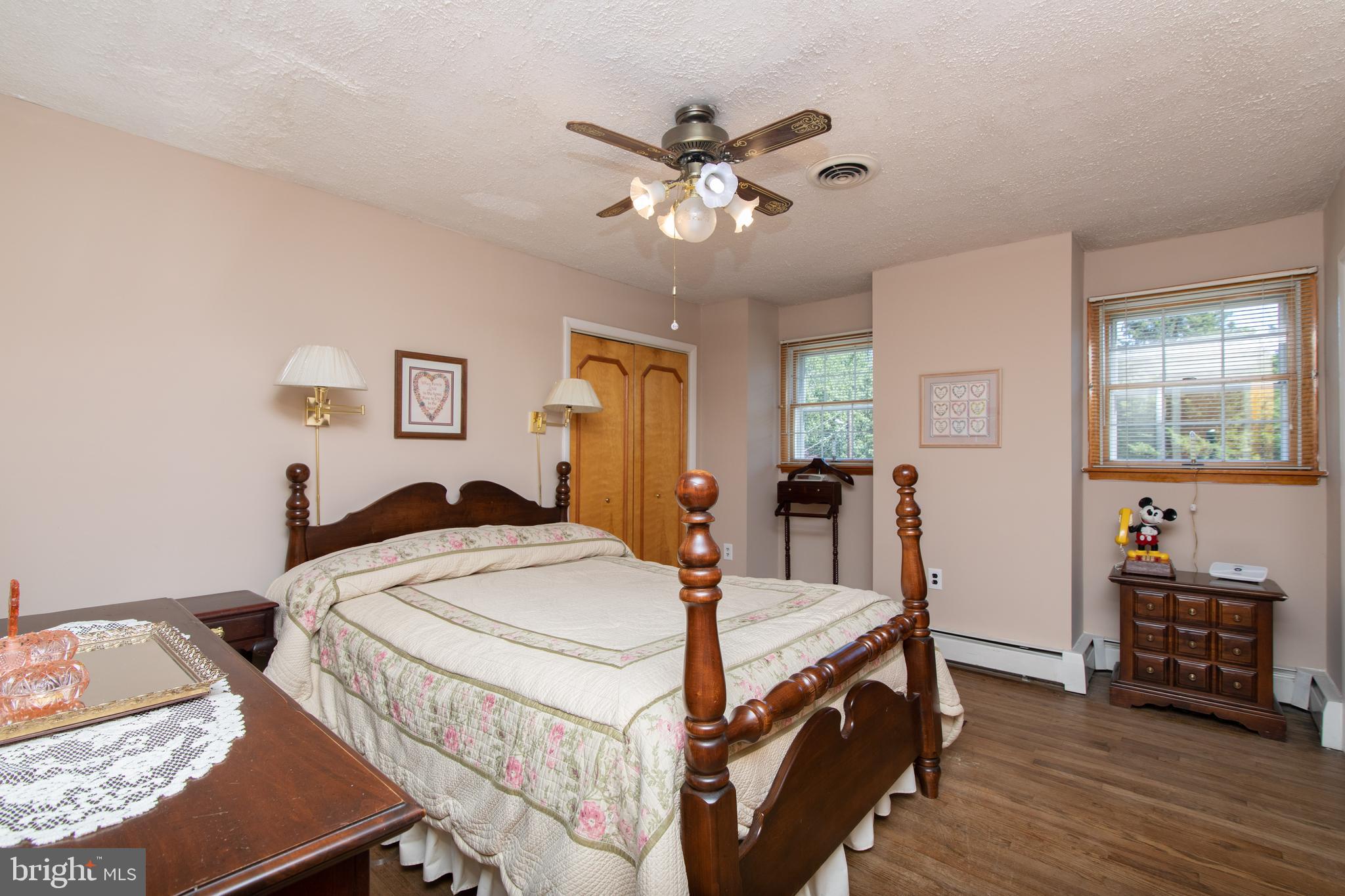 741 Heritage Road Sewell, NJ 08080 - Photo 31 of 60 a bed room with a bed and a chandelier