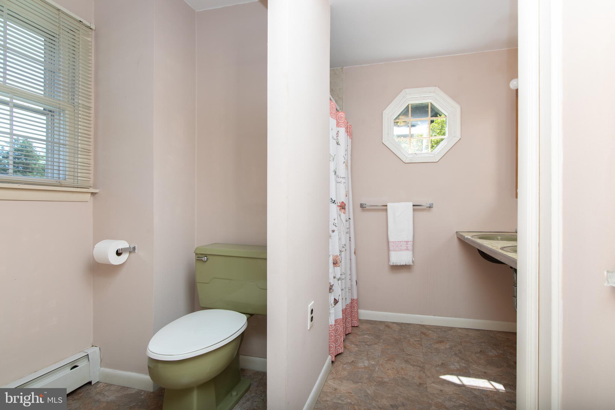 741 Heritage Road Sewell, NJ 08080 - Photo 35 of 60 a bathroom with a granite countertop toilet and a sink