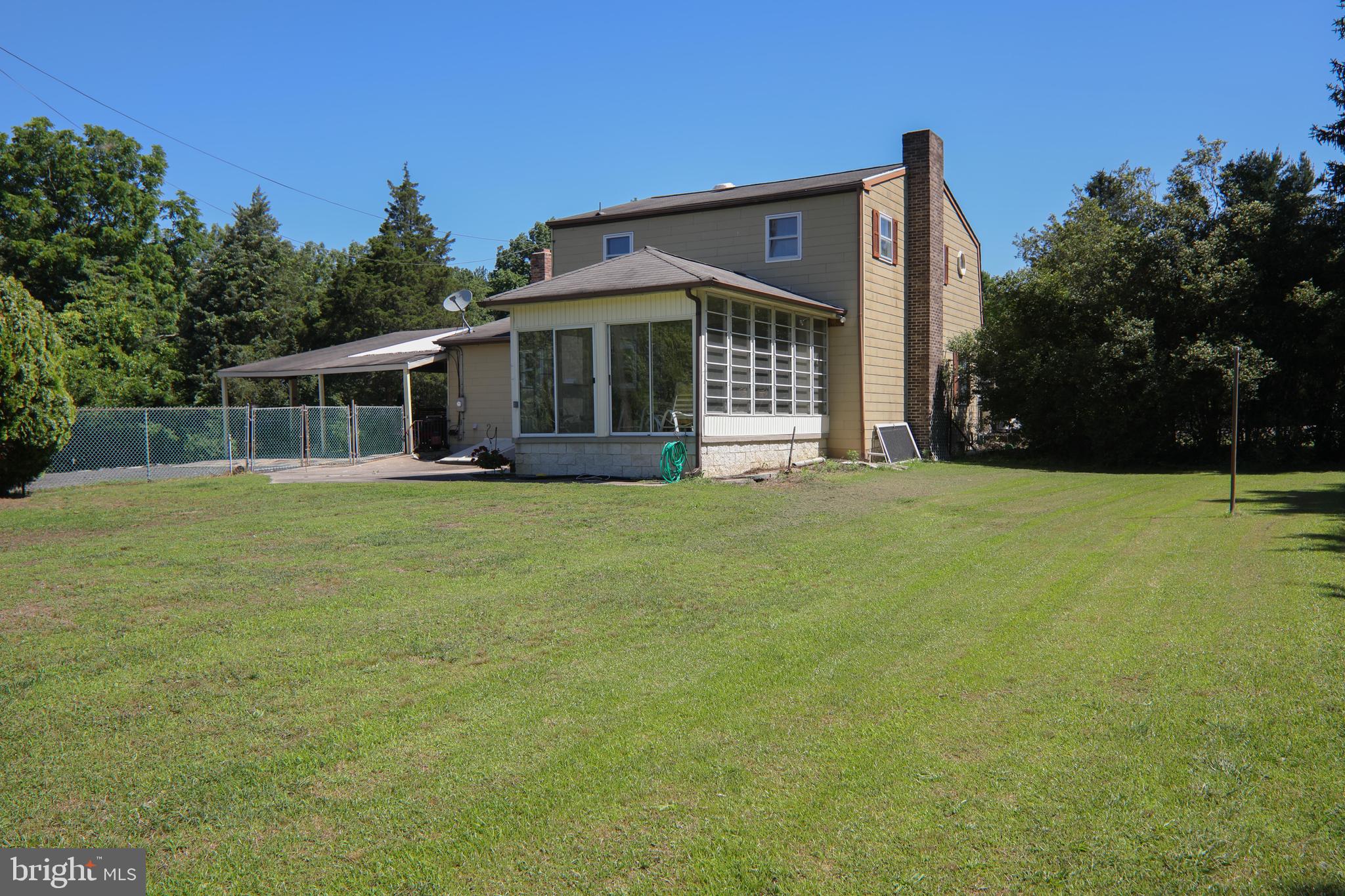 741 Heritage Road Sewell, NJ 08080 - Photo 56 of 60 a view of a house with a big yard and large trees