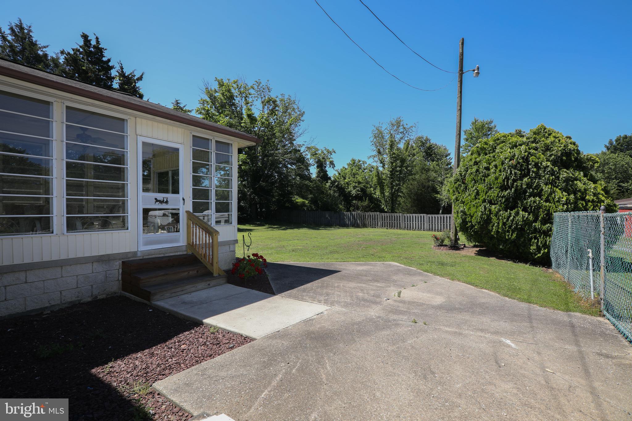 741 Heritage Road Sewell, NJ 08080 - Photo 59 of 60 a view of a house with backyard and porch