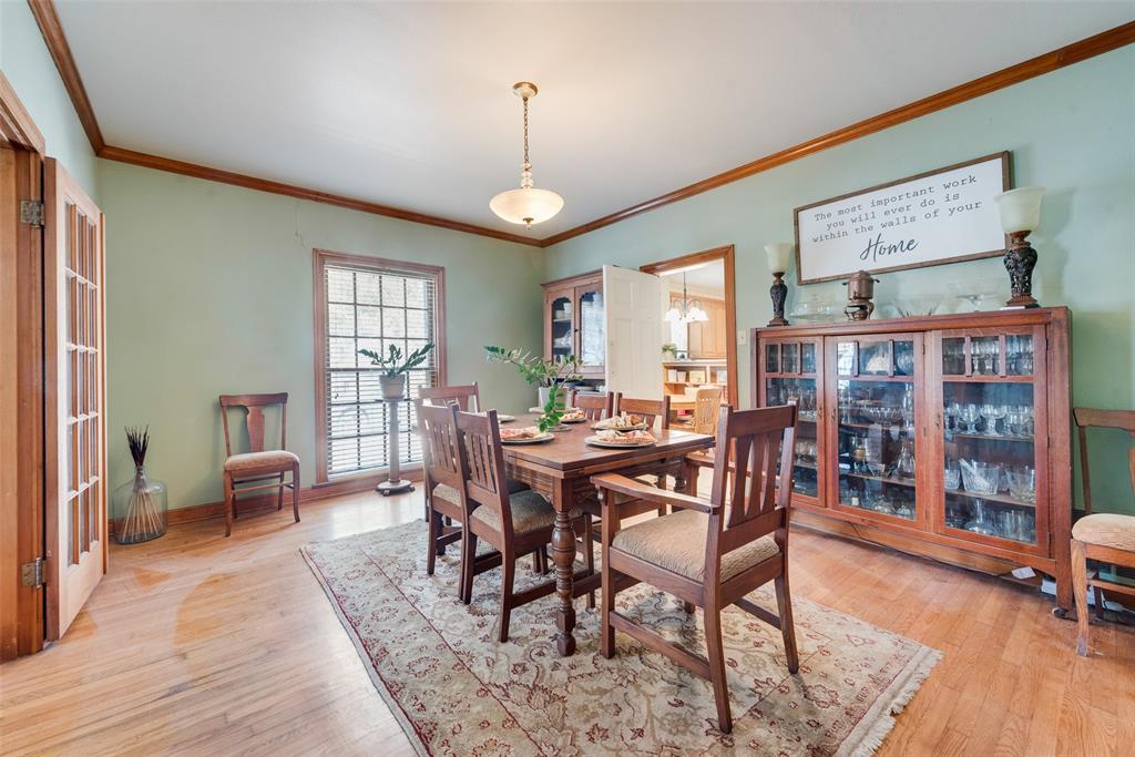 233 East High Street Wills Point, TX 75169 - Photo 9 of 40 Dining room featuring ornamental molding and light wood-style floors