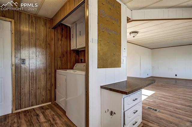 5274 South Yoder Road Yoder, CO 80864 - Photo 26 of 42 LAUNDRY AREA 5354 HOME-WASHER/DRYER INCLUDED