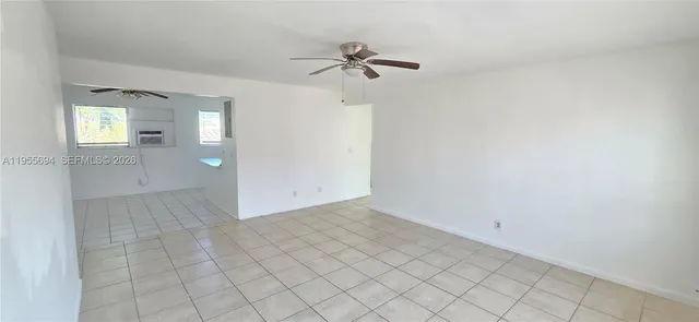 a view of a room with white walls and white walls