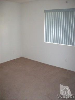 560 Spring Road, Unit 81 Moorpark, CA 93021 - Photo 12 of 14 a view of an empty room with a window