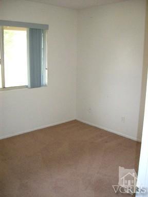 560 Spring Road, Unit 81 Moorpark, CA 93021 - Photo 13 of 14 an empty room with a window