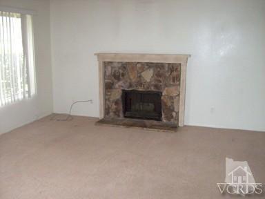 560 Spring Road, Unit 81 Moorpark, CA 93021 - Photo 6 of 14 an empty room with windows