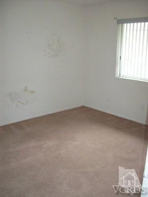 560 Spring Road, Unit 81 Moorpark, CA 93021 - Photo 10 of 14 an empty room with a window