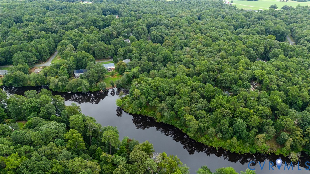 4363 Sandy Valley Road Mechanicsville, VA 23111 - Photo 4 of 19 an aerial view of residential house with outdoor space and trees all around