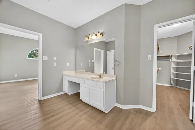 a view of entryway with wooden floor