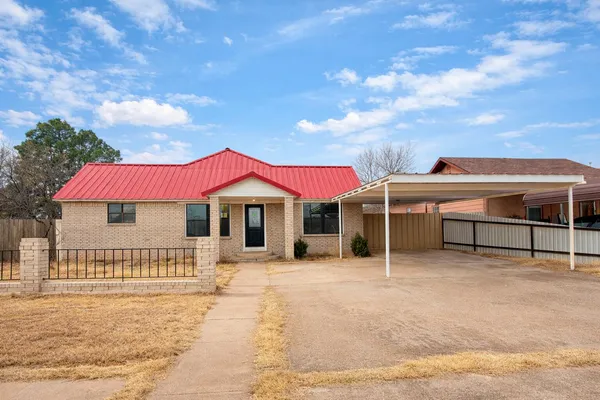 a view of a house with a patio