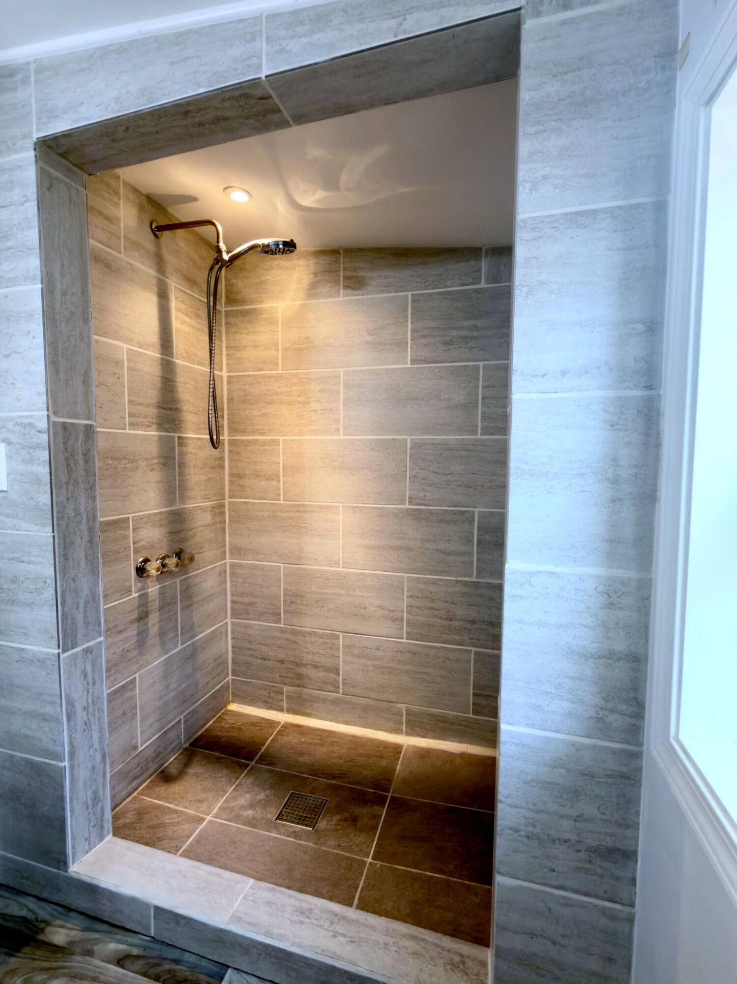 611 South Avenue H Post, TX 79356 - Photo 20 of 32 a bathroom with a glass door shower