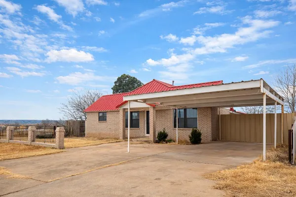 a view of a house with a patio