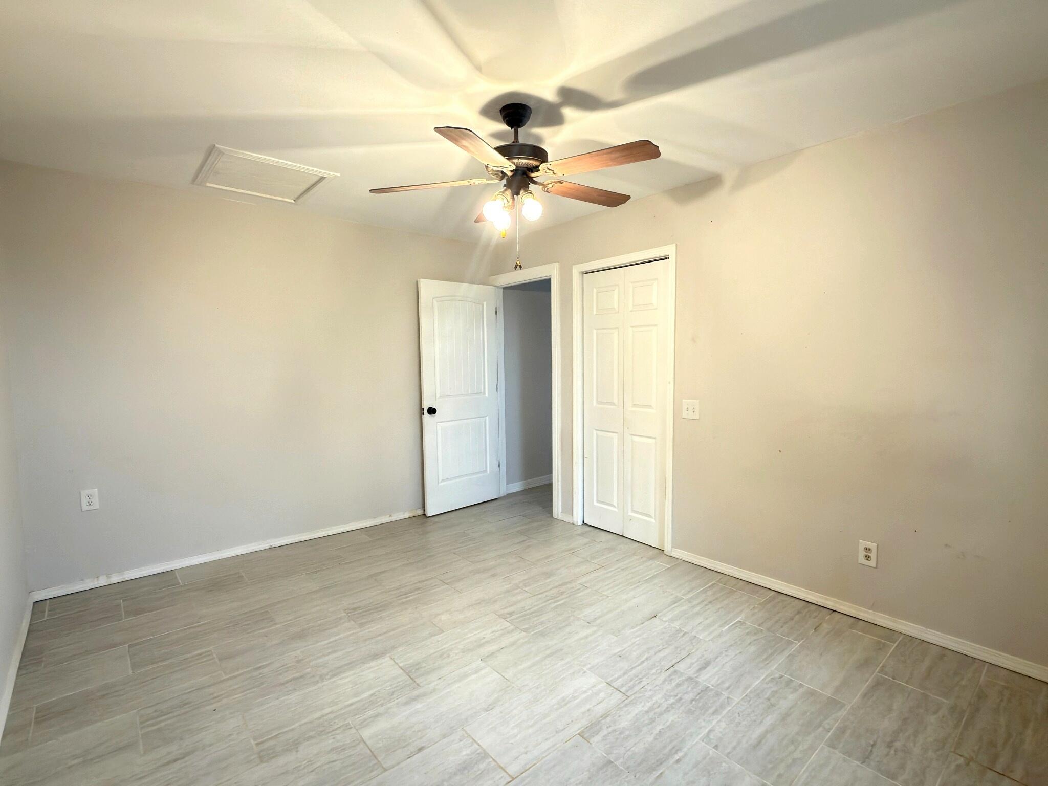 611 South Avenue H Post, TX 79356 - Photo 28 of 32 wooden floor in an empty room