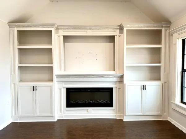 a living room with a fireplace