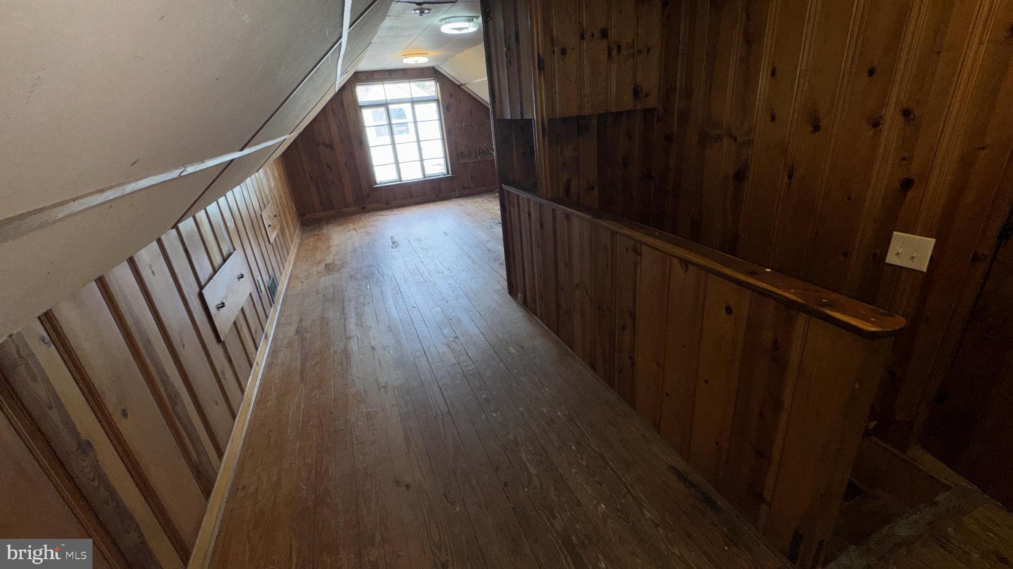 6502 Knollbrook Drive Hyattsville, MD 20783 - Photo 14 of 21 a view of stairs with wooden floor