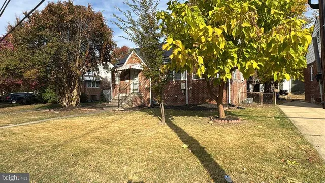 a swimming pool with trees in the background