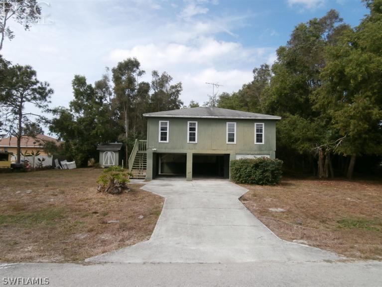 7615 Carrier Road Fort Myers, FL 33967 - Photo 1 of 8 a view of a house with a patio