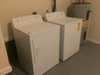 9063 Pembroke Road, Unit B Oak Grove, TN 42262 - Photo 11 of 12 a utility room with dryer and washer