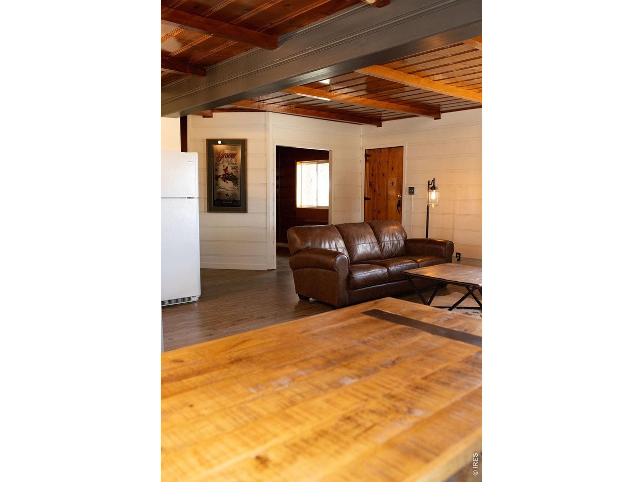 218 Pershing Street Grover, CO 80729 - Photo 16 of 50 Natural Wood Accents and an Open-Concept Design Blend Warmth with Modern Style