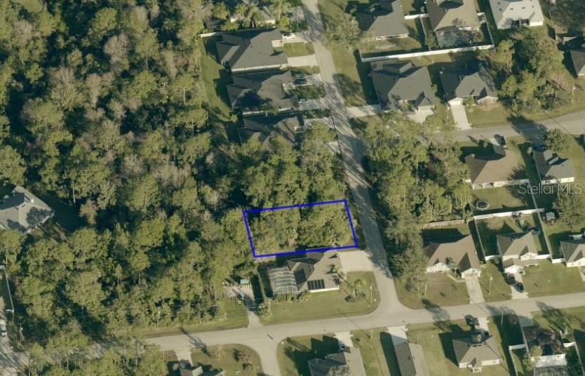 3 Seattle Trail Palm Coast, FL 32164 - Photo 10 of 16 an aerial view of a house with a yard