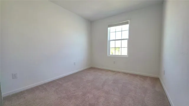 an empty room with window