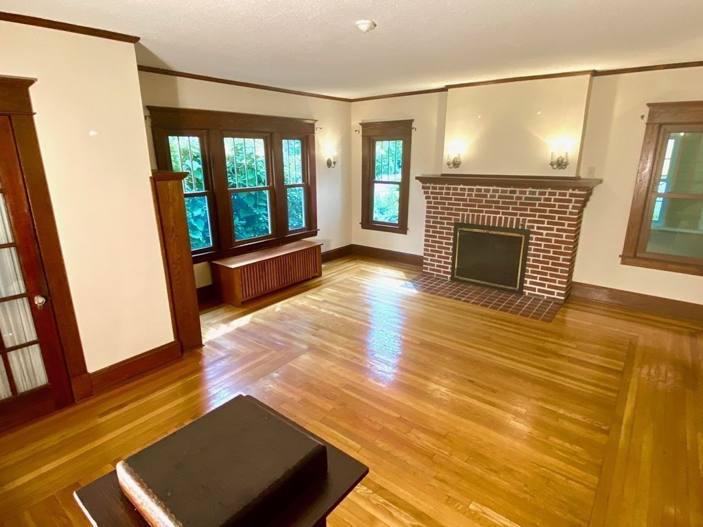 36 Maple Road Longmeadow, MA 01106 - Photo 4 of 21 a view of livingroom with furniture fireplace and hardwood floor
