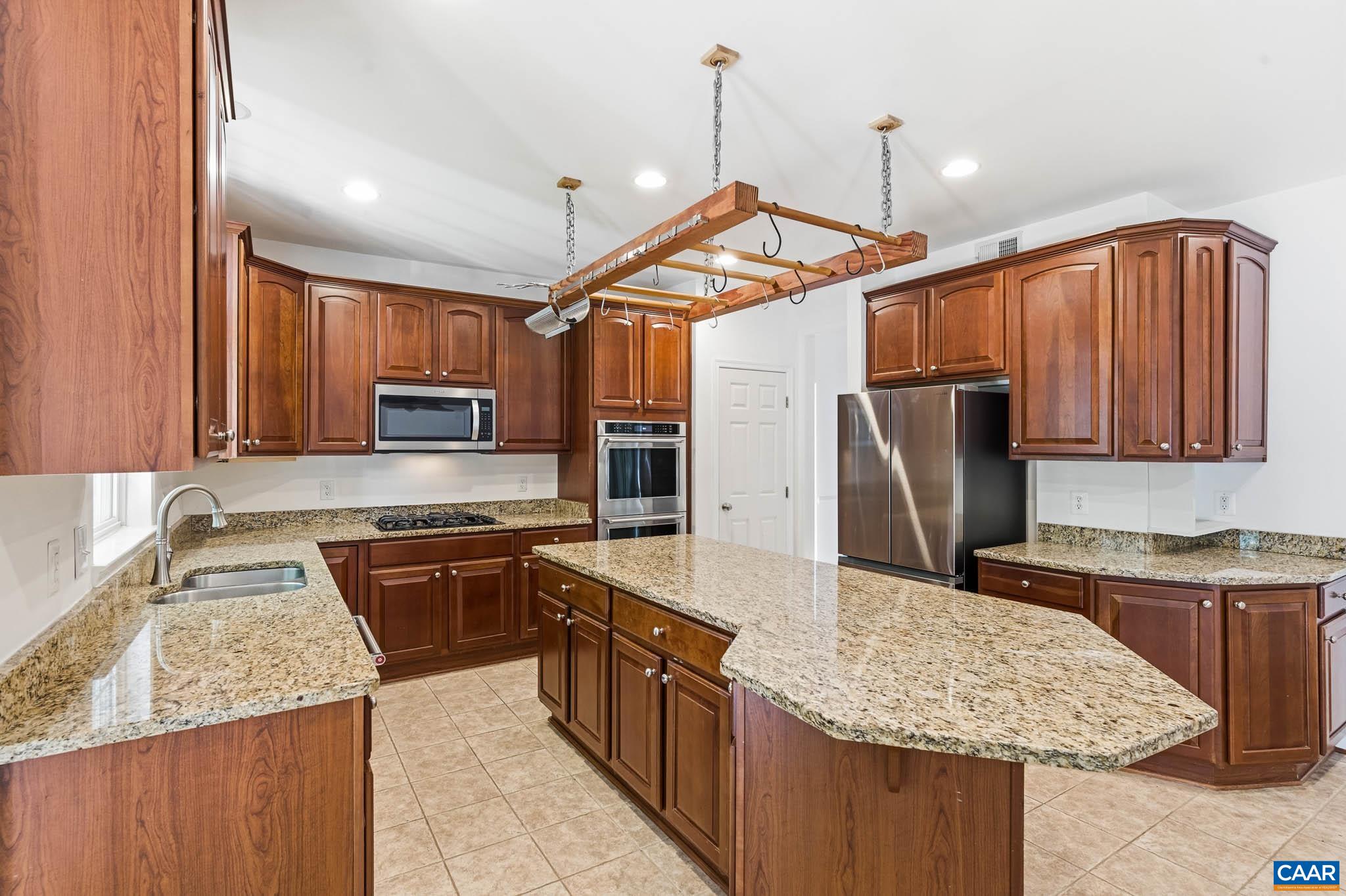 700 Rainier Road Charlottesville, VA 22903 - Photo 10 of 41 Kitchen with ample storage including pantry and prep space.