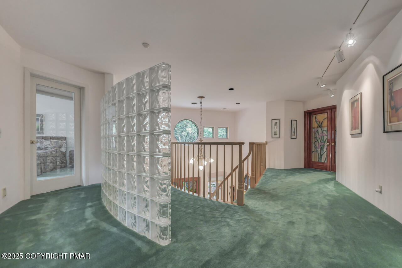 6696 Cherry Valley Road Stroudsburg, PA 18360 - Photo 67 of 97 Upper Foyer Glass Privacy Wall