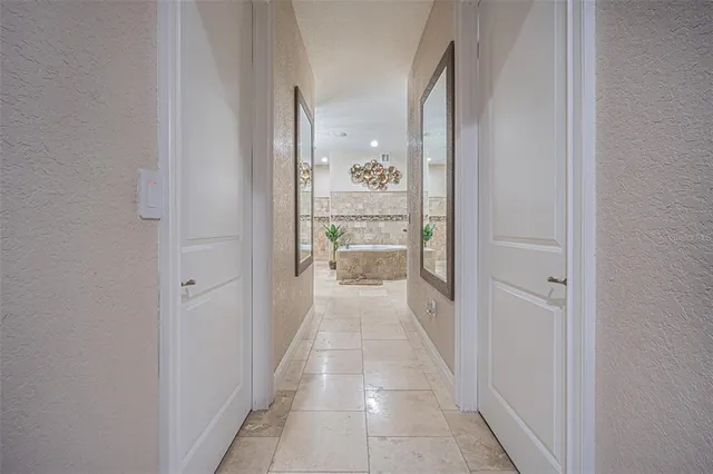 a living room with fireplace furniture and a flat screen tv