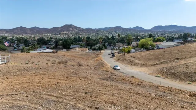 a view of a mountain with a beach