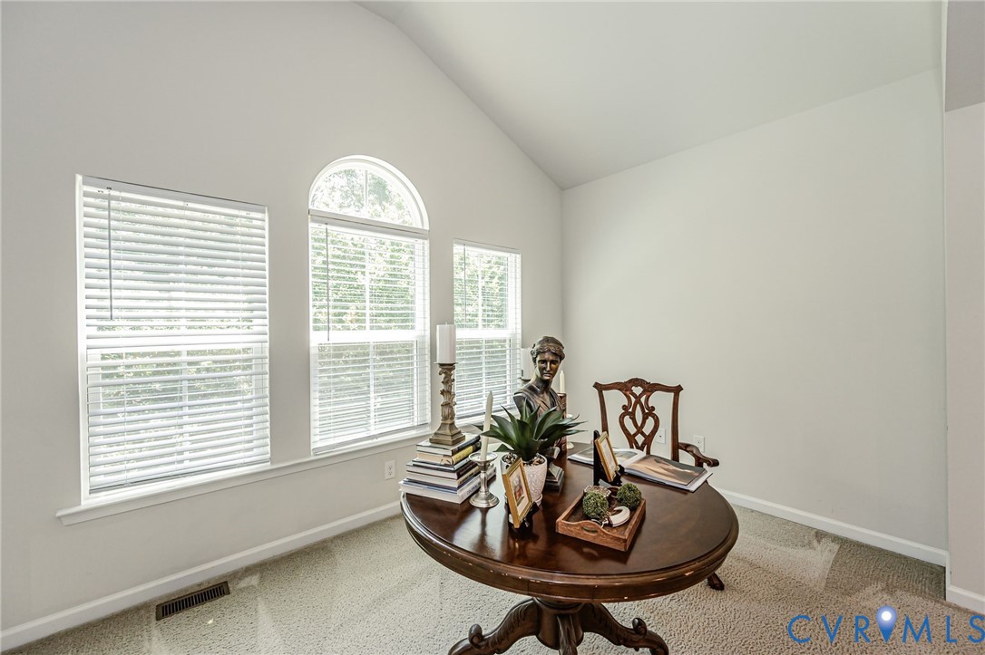 7435 Wicks Road Williamsburg, VA 23188 - Photo 44 of 82 Primary Suite Sitting Room with so much light