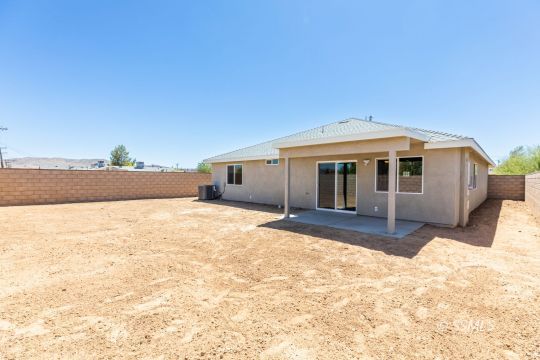 1012 Sims Street Ridgecrest, CA 93555 - Photo 35 of 36 a front view of a house with a yard