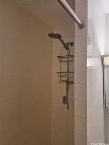 a kitchen with a sink and a refrigerator