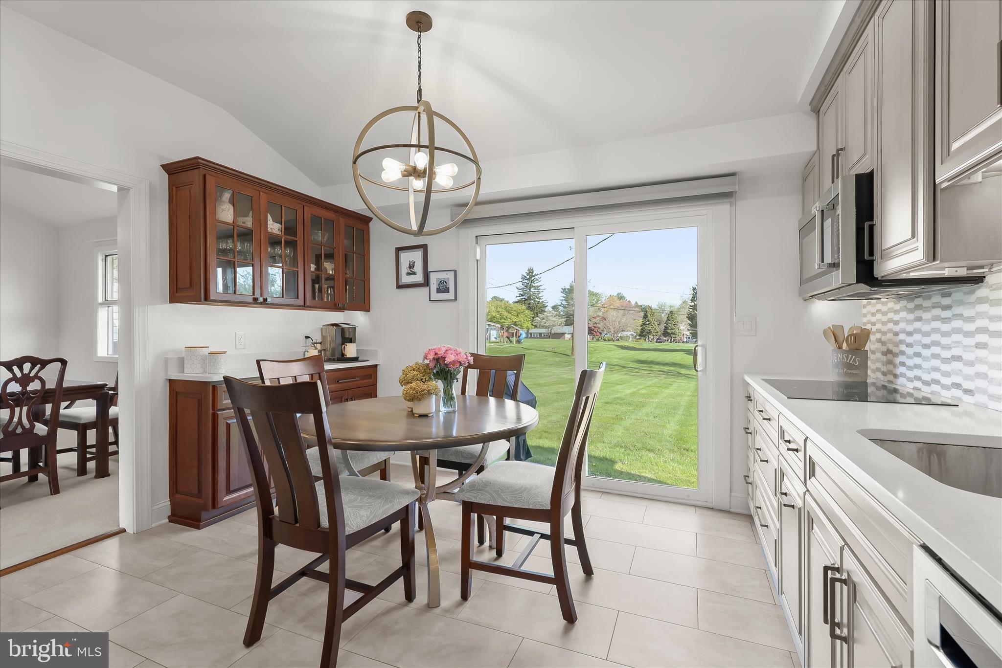 3416 Manor Hill Road Pikesville, MD 21208 - Photo 20 of 68 a view of a dining room with furniture window and outside view