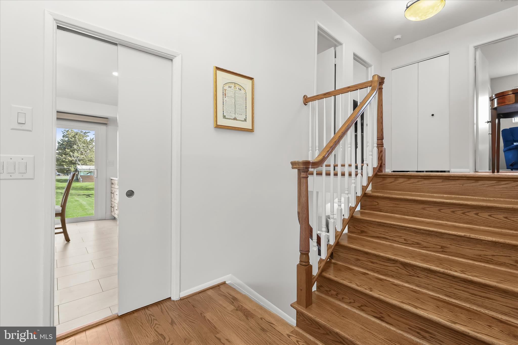 3416 Manor Hill Road Pikesville, MD 21208 - Photo 24 of 68 a view of entryway with wooden floor and stairs