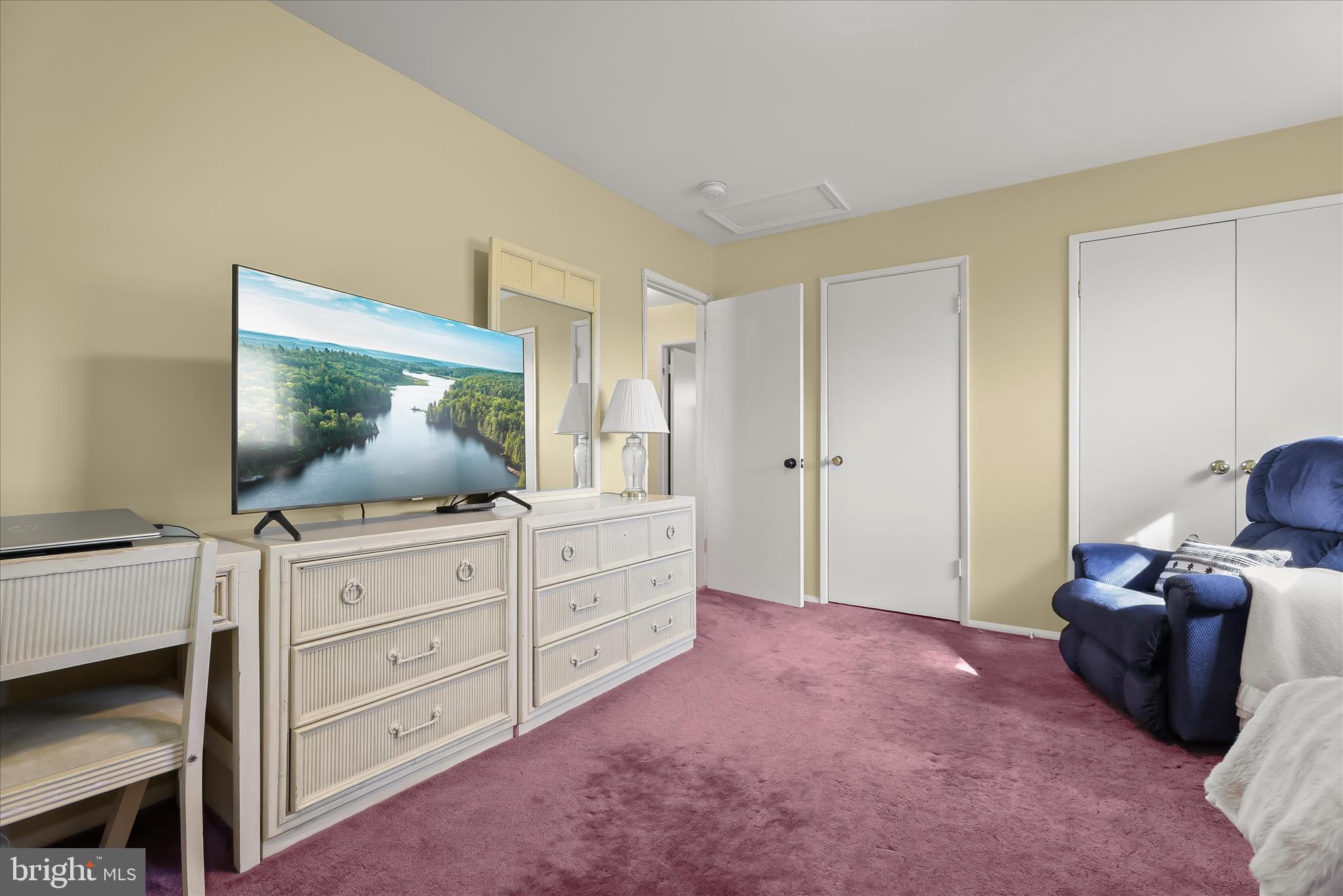 3416 Manor Hill Road Pikesville, MD 21208 - Photo 34 of 68 a bedroom with a bed and a dresser in it