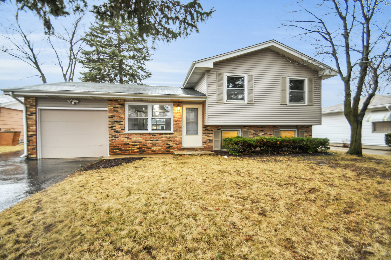 809 Cove Avenue Lockport, IL 60441 - Photo 1 of 22 a front view of a house with a yard