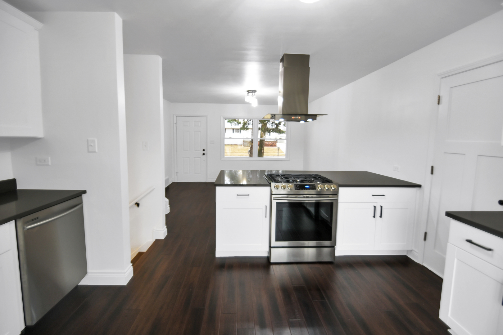 809 Cove Avenue Lockport, IL 60441 - Photo 8 of 22 a kitchen with granite countertop a stove and a refrigerator