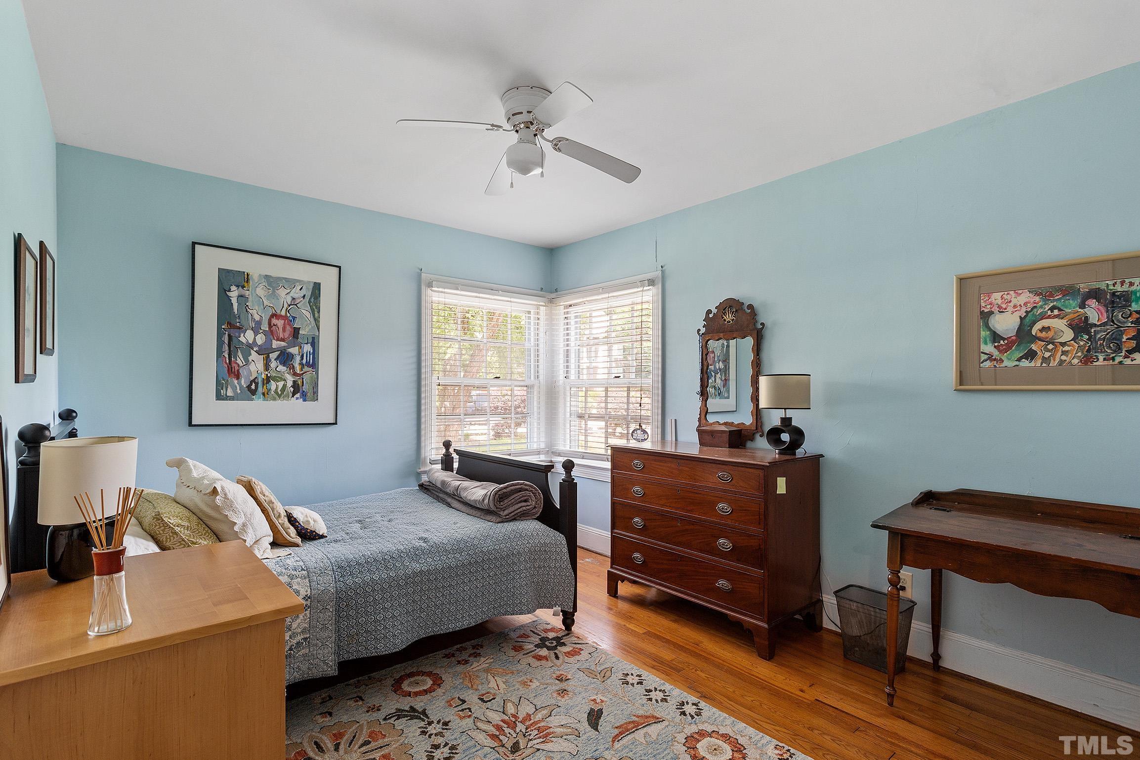 121 Lake Boone Trail Raleigh, NC 27608 - Photo 15 of 29 a bed room with a bed and a dresser