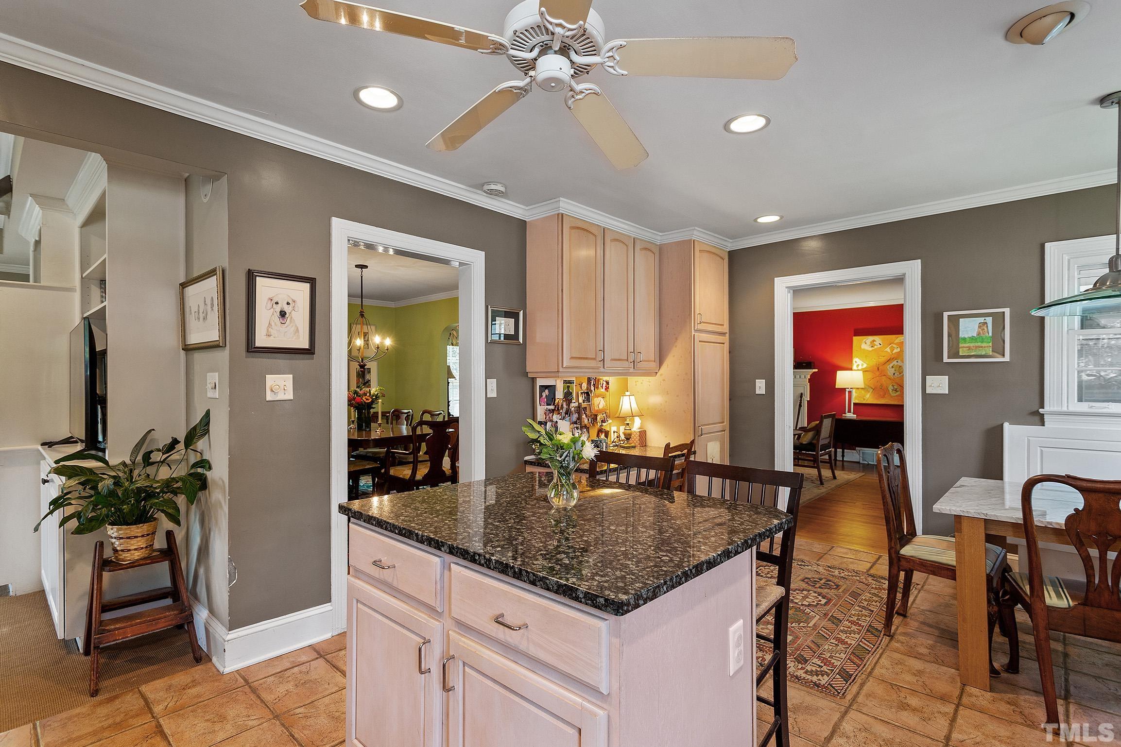 121 Lake Boone Trail Raleigh, NC 27608 - Photo 21 of 29 a room with granite countertop lots of furniture and potted plant