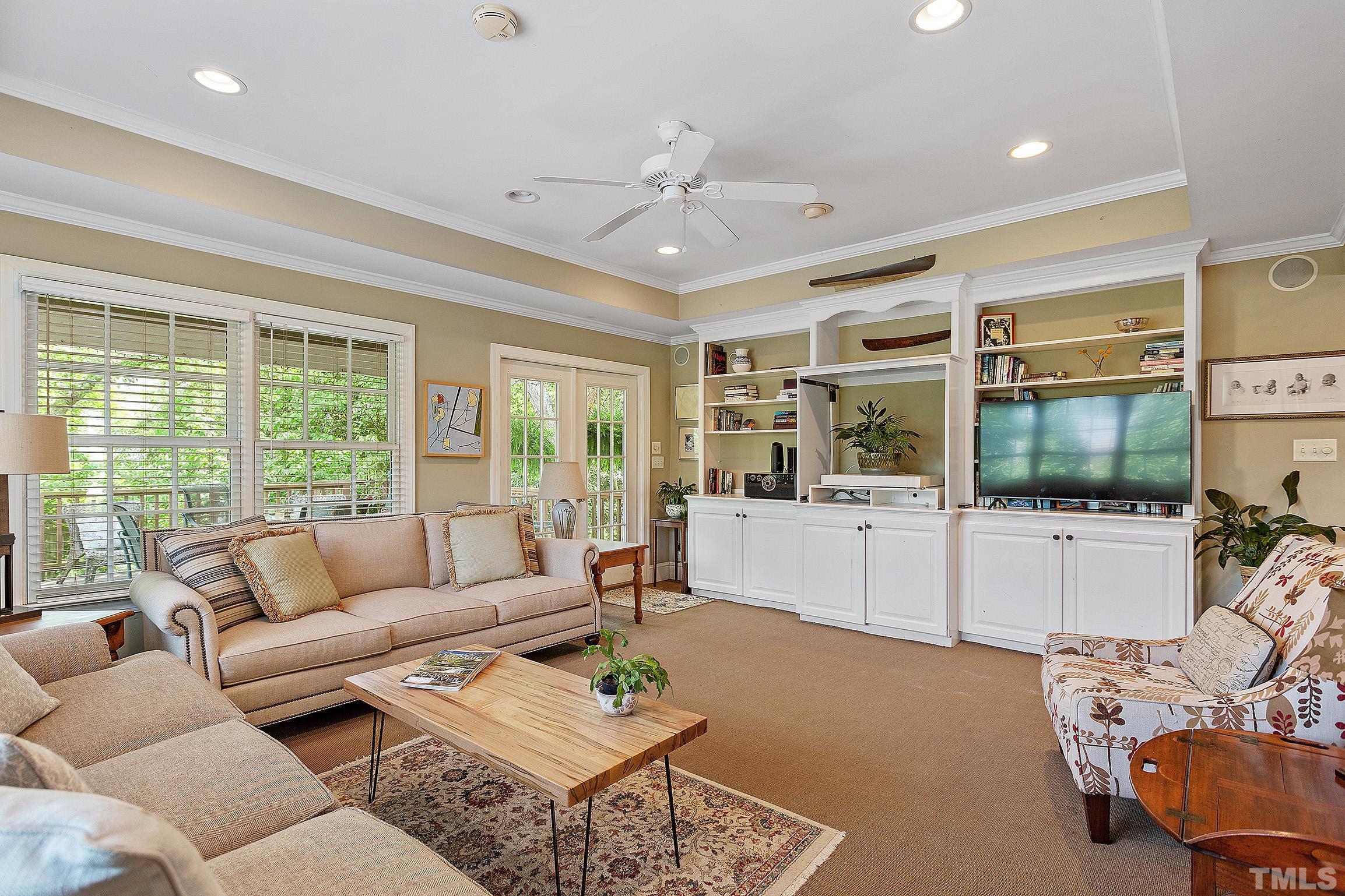 121 Lake Boone Trail Raleigh, NC 27608 - Photo 22 of 29 a living room with furniture and a large window