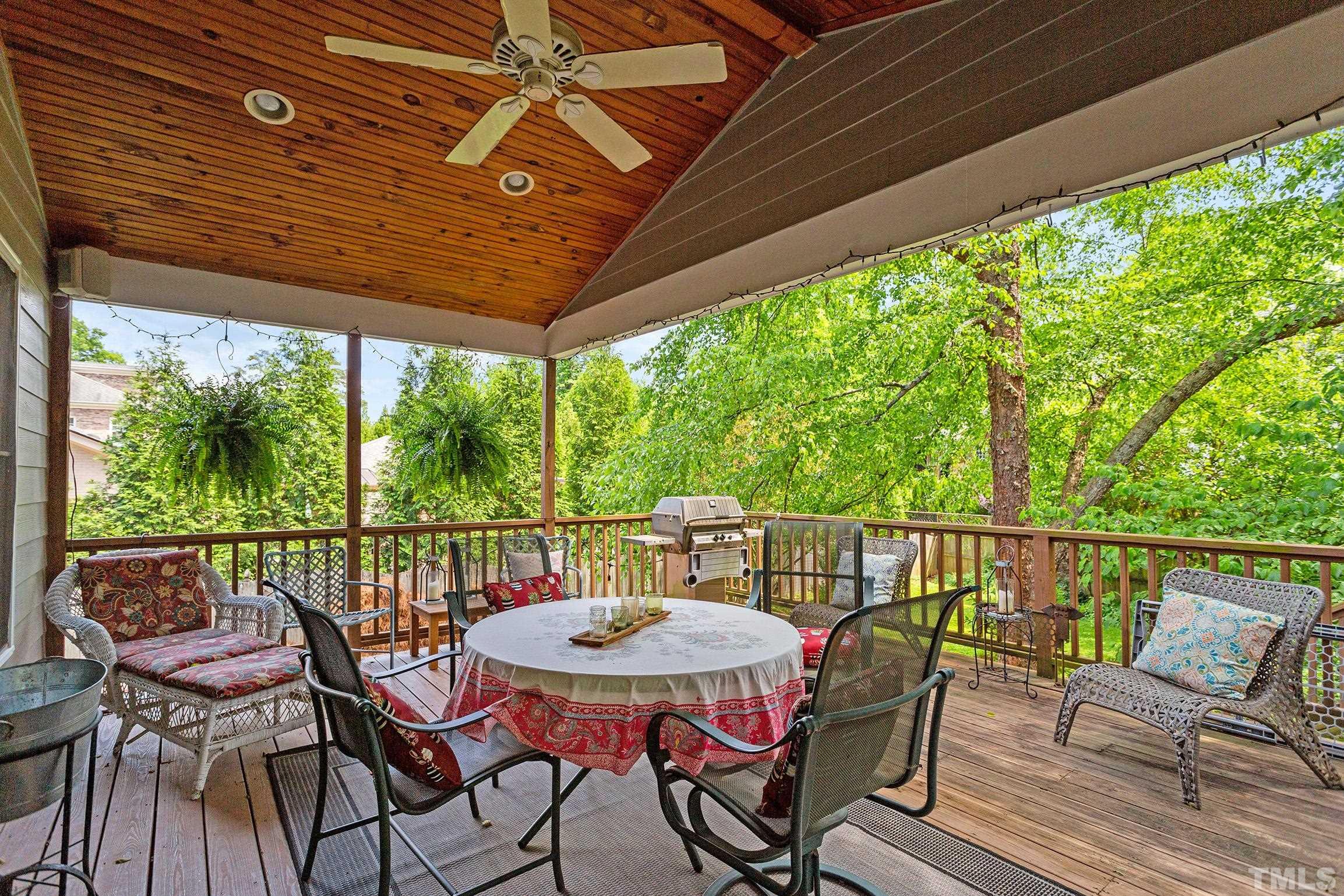 121 Lake Boone Trail Raleigh, NC 27608 - Photo 26 of 29 a view of a patio with a table chairs and a table