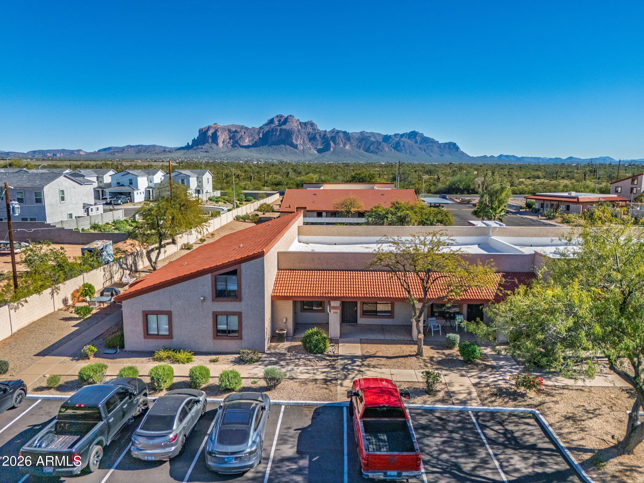 1440 North Idaho Road, Unit 1024 Apache Junction, AZ 85119 - Photo 8 of 9 a view of houses with sky view