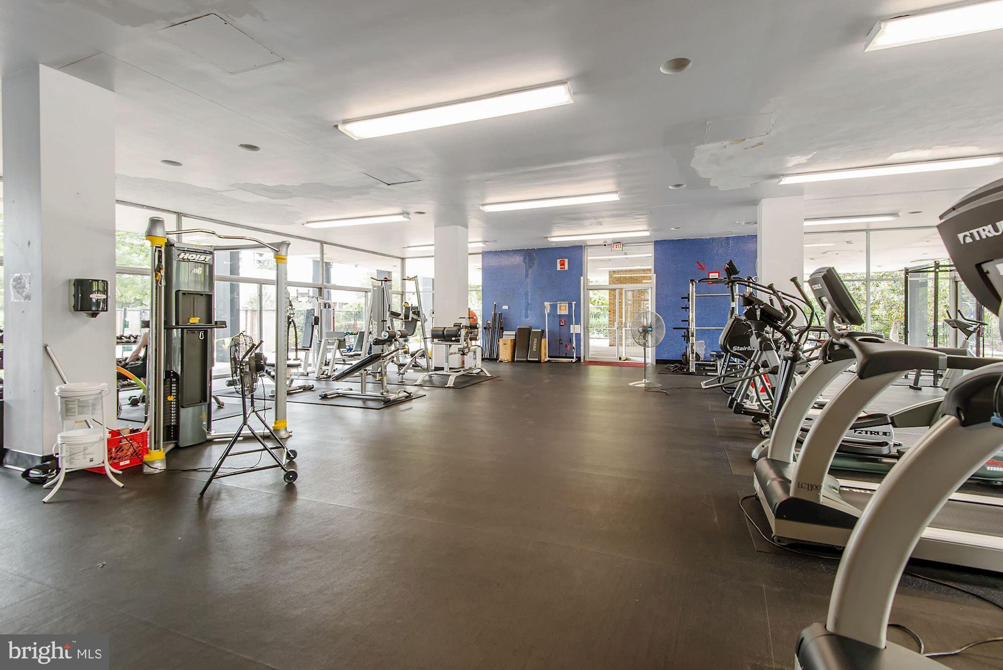 1311 Delaware Avenue Southwest, Unit S346 Washington, DC 20024 - Photo 17 of 27 a view of a room with gym equipment